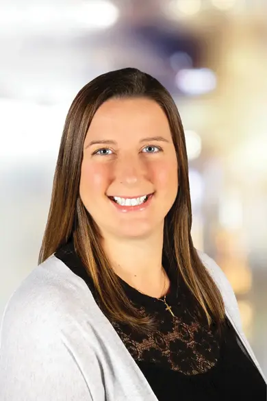 Portrait of Heather Dexter, REALTOR®.